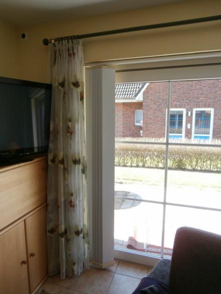 Terrassentür mit Vertikalanlage und Vorhang