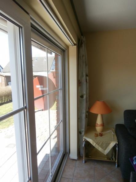 Terrassentür mit Vertikalanlage und Vorhang