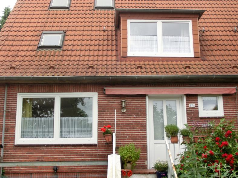 Nachher Fenster- und Terrassentürelement weiß bei Einfamilienhaus